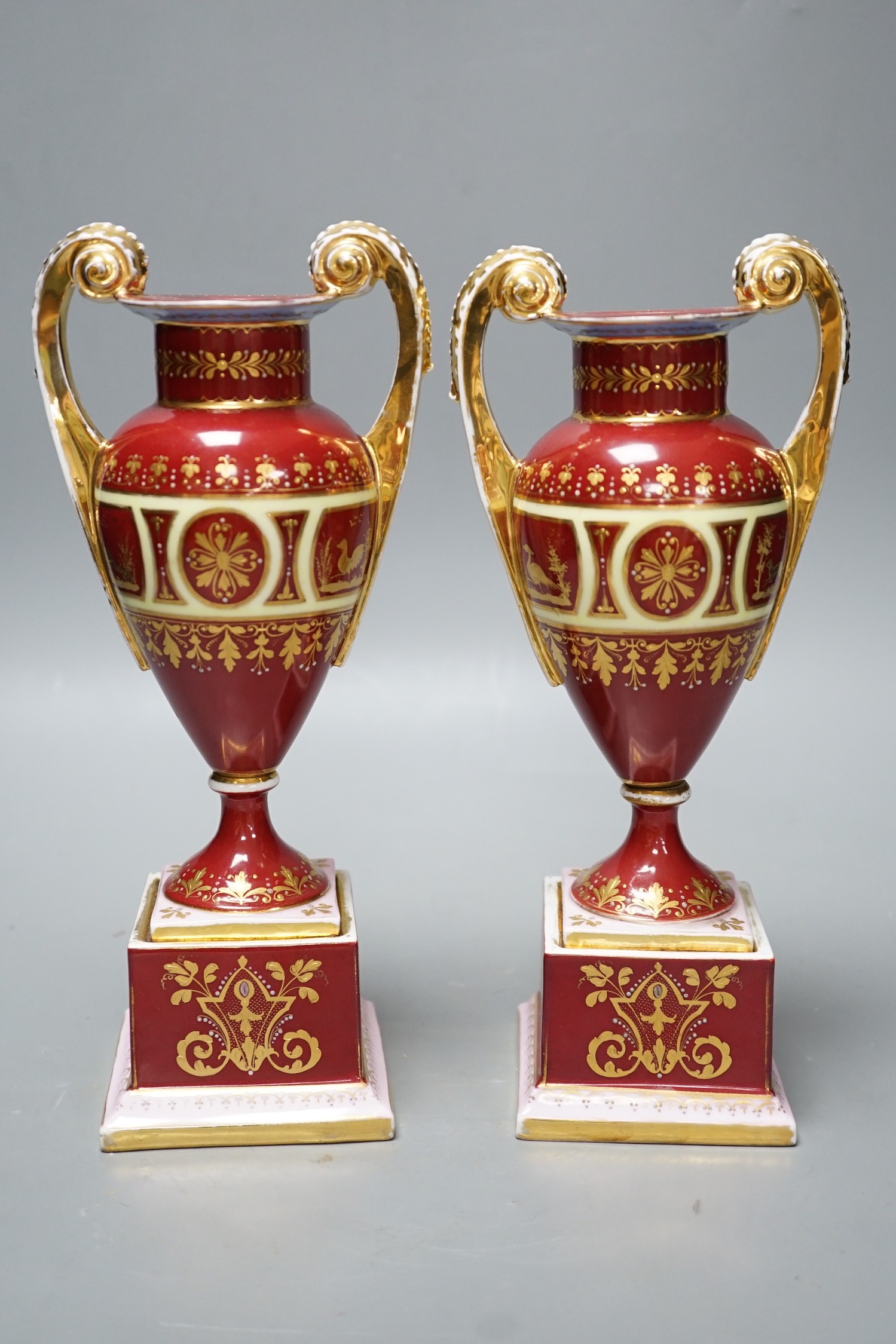 A pair of Vienna style painted porcelain vases, early 20th century 25cm